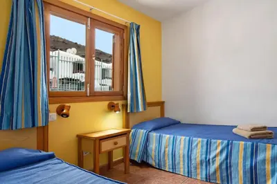 Cama o camas de una habitación en CityHub Vacational Home Puerto Rico Montecarlo 11