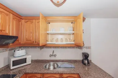 Una cocina o zona de cocina en Montecarlo Apartamento8