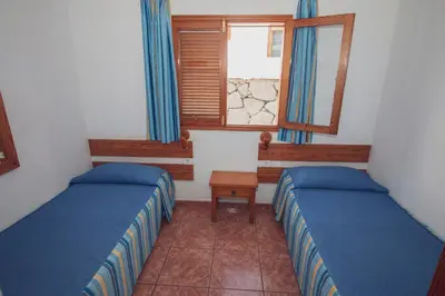 Cama o camas de una habitación en Montecarlo Apartamento30