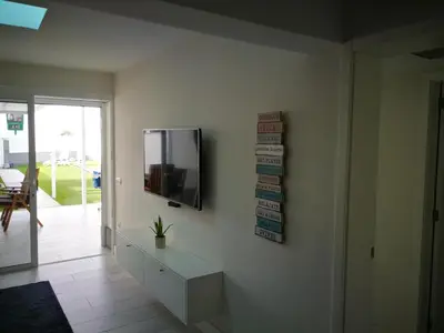 Una televisión o centro de entretenimiento en Cozy Luxury
