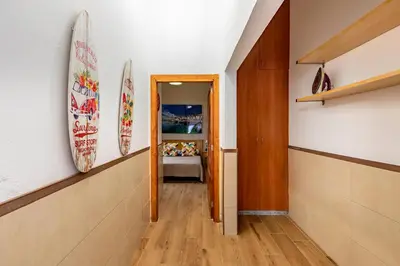 Cama o camas de una habitación en SALINETAS BLUE SURF HOUSE