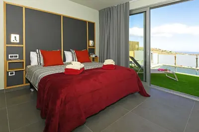 Cama o camas de una habitación en Salobre La Isla 1