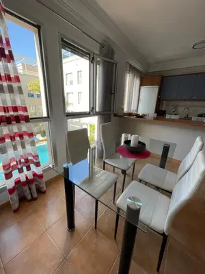 Una cocina o zona de cocina en APARTAMENT SARDINA NEAR THE BEACH WITH POOL AND WIFI I