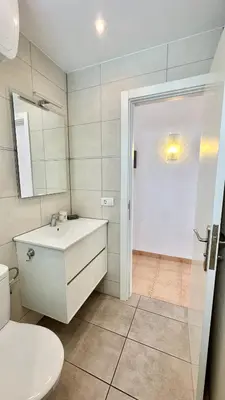 Un baño de Omar Holidays