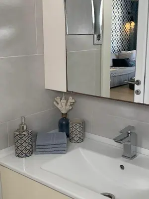 Un baño de Boutique Sea View Apartment in San Agustin