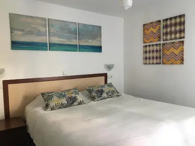 Cama o camas de una habitación en Puerto de Mogan - Little Venecia Harbour Apt 324 with 40sqm rooftop terrace, Scandinavian interior - Gran Canaria