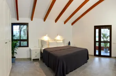 Cama o camas de una habitación en Villa Fataga - Unique villa with heated pool