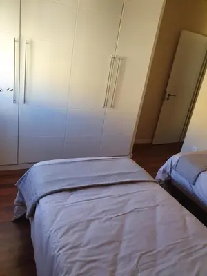 Cama o camas de una habitación en Casa ManPer playa, Alcaravaneras, 3 dormitorios