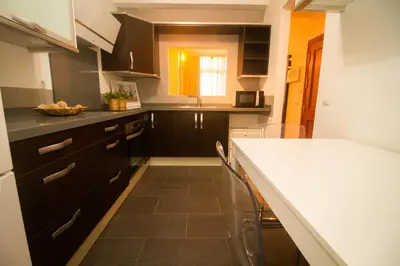 Una cocina o zona de cocina en Arinaga Zone