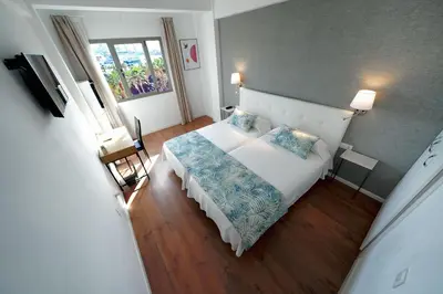 Cama o camas de una habitación en Hotel Matilde by Grupo Matilde