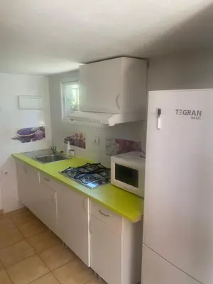 Una cocina o zona de cocina en Flor de Loto -Finquita Lotusflower