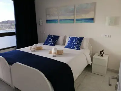 Cama o camas de una habitación en Doñana12 by SunHousesCanarias