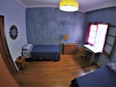 Cama o camas de una habitación en A Casa Mia