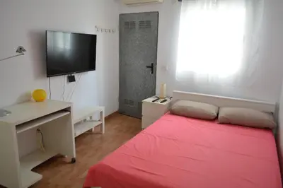 Una televisión o centro de entretenimiento en Maspalomas Studio