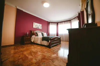 Cama o camas de una habitación en Villa Morada Sonneland con piscina privada climatizada