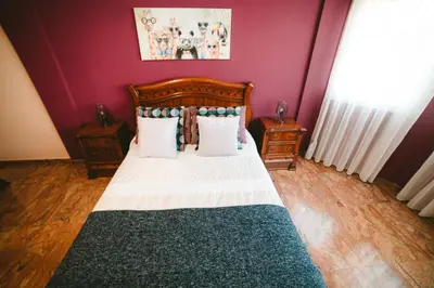 Cama o camas de una habitación en Villa Morada Sonneland con piscina privada climatizada
