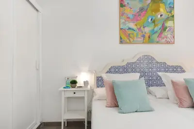 Cama o camas de una habitación en Beach Apartment in Playa del Cura 323 by VillaGranCanaria