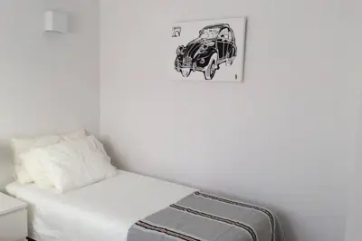 Cama o camas de una habitación en Chalet pareado a 5 minutos andando de la playa