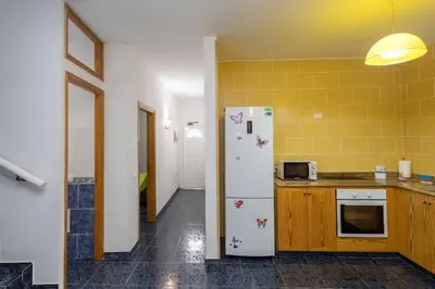 Una cocina o zona de cocina en GuestReady - Gadi House Tasarte