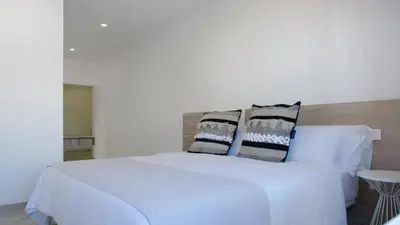 Cama o camas de una habitación en Deva Beach Boutique Apartments