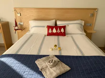 Cama o camas de una habitación en Touch the Sea