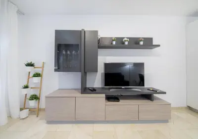 Una televisión o centro de entretenimiento en Ferreras Canteras Home By CanariasGetaway