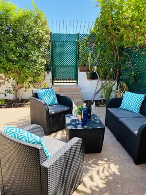 Zona de estar de Bungalow Los Porches by SunHousesCanarias