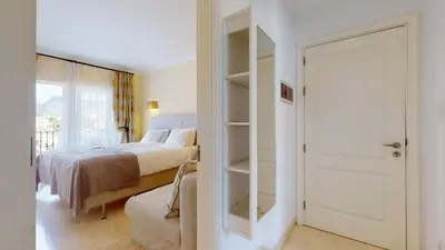 Cama o camas de una habitación en Charmante Wohnung direkt am Meer, kostenloses WLAN