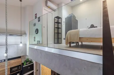 Cama o camas de una habitación en Apartamentos Marina Suites 6E