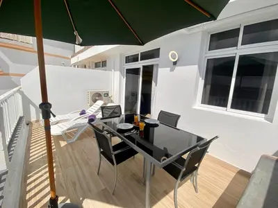 Zona de estar de Sunset and Amadores Beach View