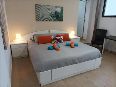 Cama o camas de una habitación en La Villa Calypso - Vivienda Vacacional con Piscina Privada