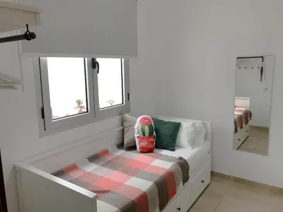 Cama o camas de una habitación en Citybeach - parking & wifi