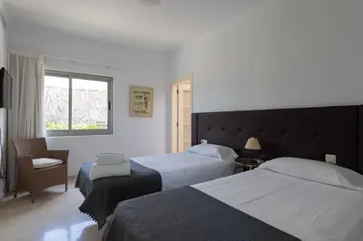 Cama o camas de una habitación en Tauro Villas Deluxe