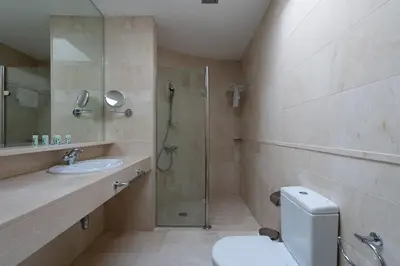 Un baño de Tauro Villas Deluxe