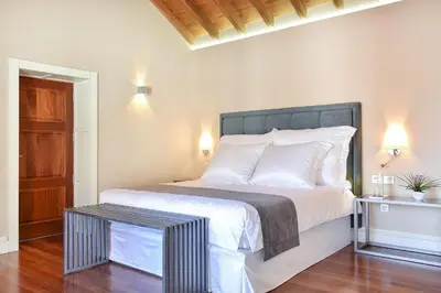 Cama o camas de una habitación en Allureh Emblematic Lodging