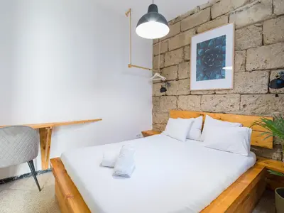 Cama o camas de una habitación en Cathedral Apartment