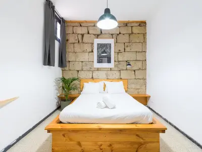 Cama o camas de una habitación en Cathedral Apartment