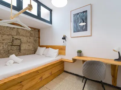 Cama o camas de una habitación en Cathedral Apartment