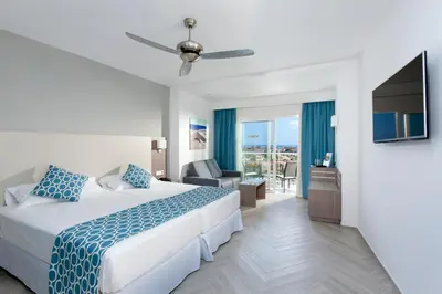 Cama o camas de una habitación en Hotel Riu Papayas - All Inclusive