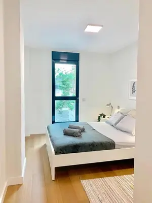 Cama o camas de una habitación en Elegant Beach Flat