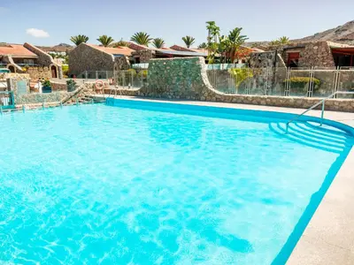 Piscina en o cerca de Duplex Anfi Topaz