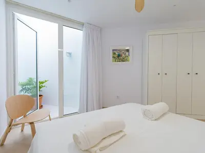 Cama o camas de una habitación en Pasitoblanco Porto Mare 7 Seaview Villa private heated pool
