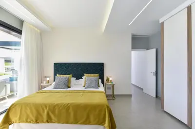 Cama o camas de una habitación en Salobre Sunset Villa V&L Salobre by VillaGranCanaria