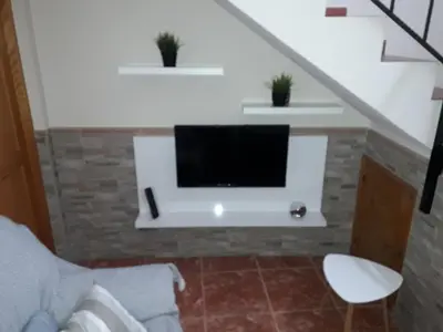 Una televisión o centro de entretenimiento en Casa los abuelos 1
