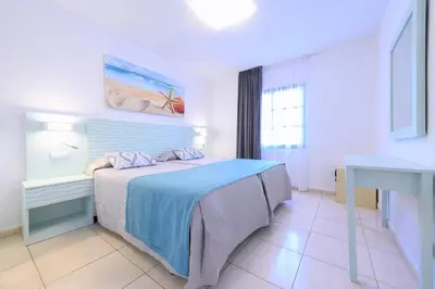 Cama o camas de una habitación en Valle Marina Apartamentos