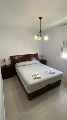 Cama o camas de una habitación en Golden Apartment