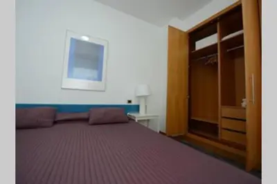 Cama o camas de una habitación en Edificio Gaviota apartamento 3