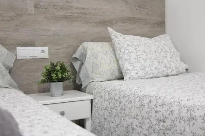 Cama o camas de una habitación en Estancia en Complejo Tamarán - Playa del Inglés