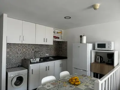 Una cocina o zona de cocina en Estancia en Complejo Tamarán - Playa del Inglés