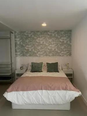 Cama o camas de una habitación en Descanso junto a las dunas